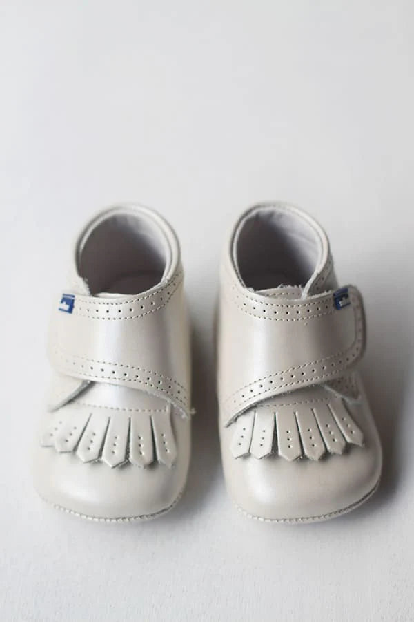 Chaussons frange cuir beige