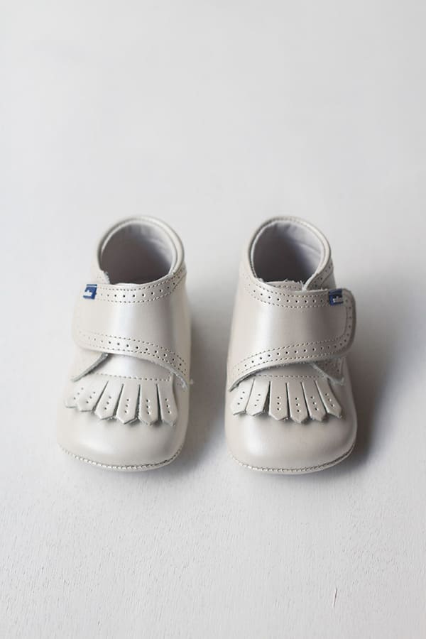 Chaussons frange cuir beige